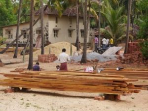 Carpenters assembling roof rafters